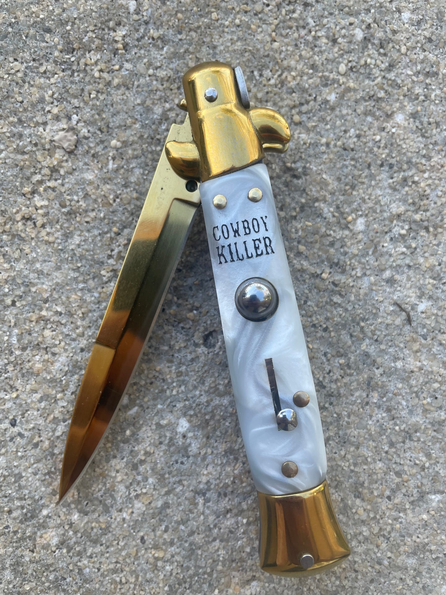 Cowboy Killer stilletto with cigarette logo back