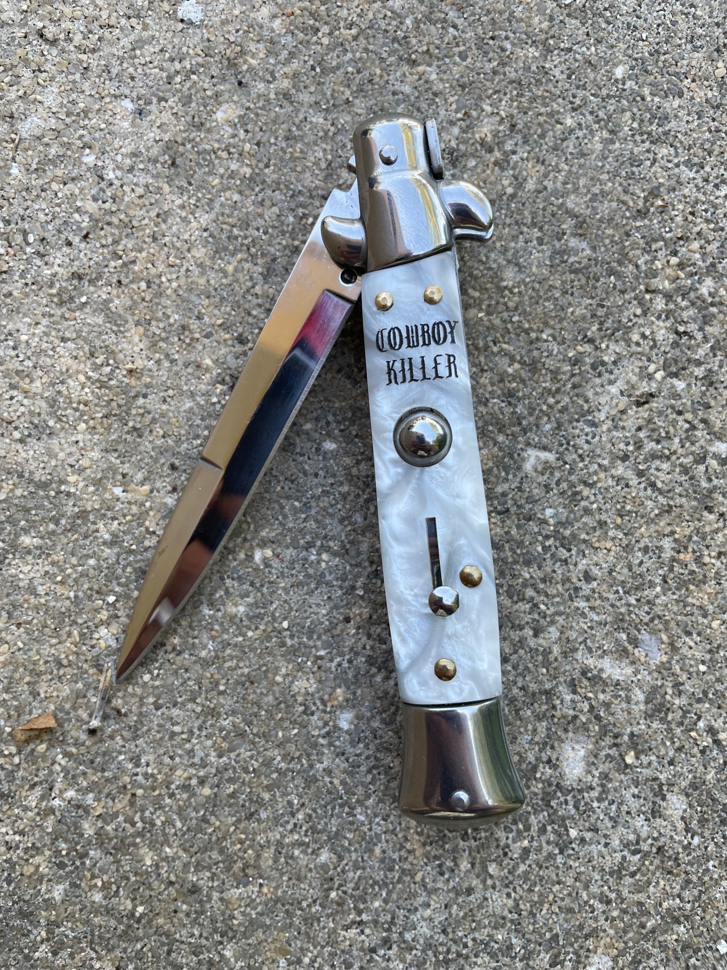 Cowboy Killer stilletto with cigarette logo back