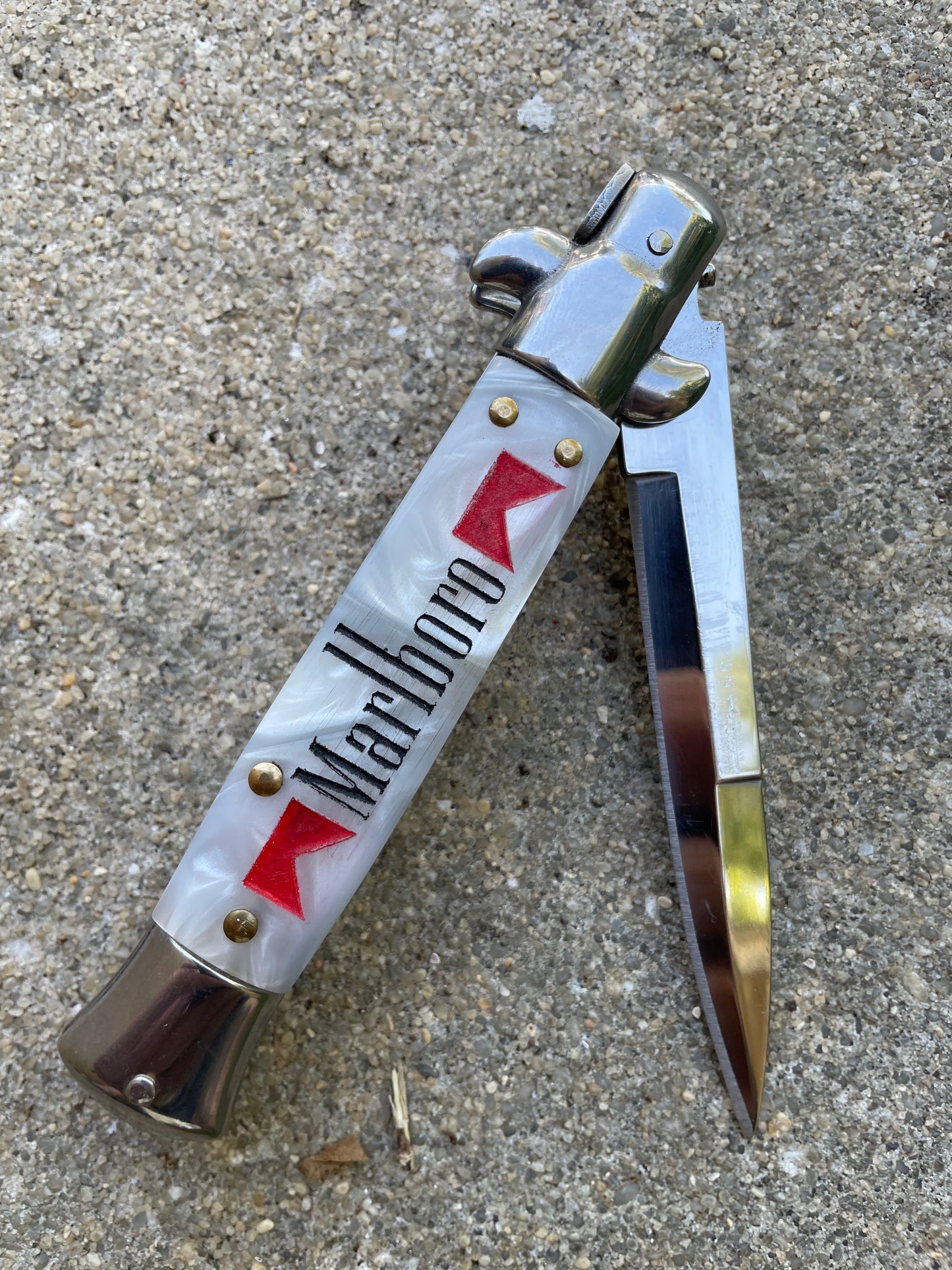 Cowboy Killer stilletto with cigarette logo back