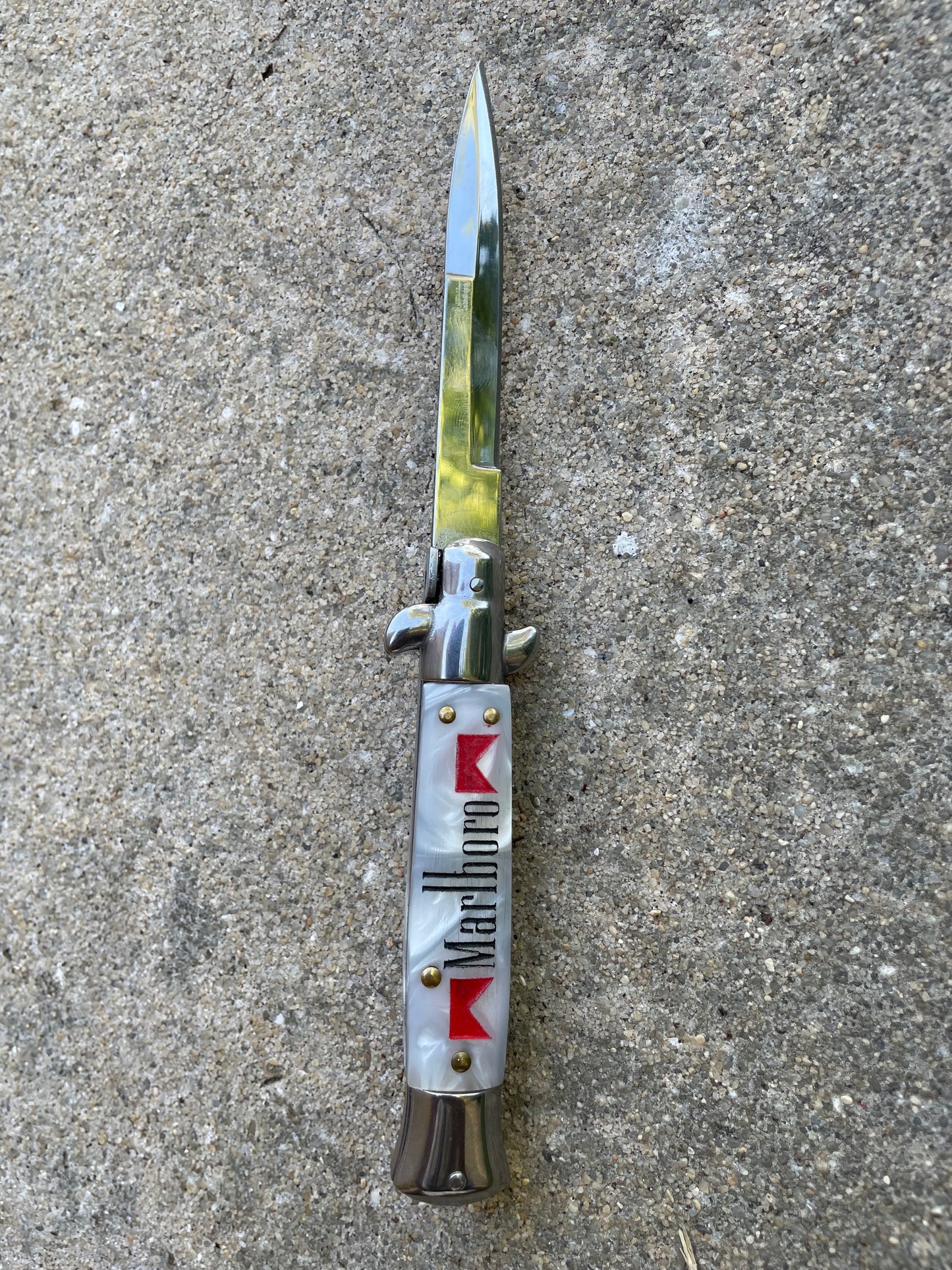 Cowboy Killer stilletto with cigarette logo back
