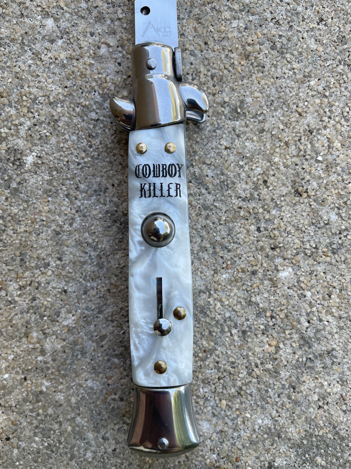 Cowboy Killer stilletto with cigarette logo back